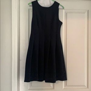 Navy dress with cut out hem